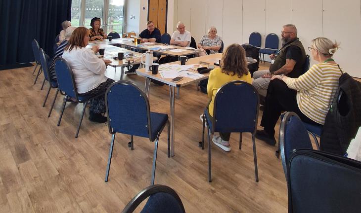 Picture of staff, board members and residents at the Bromham residents' meeting