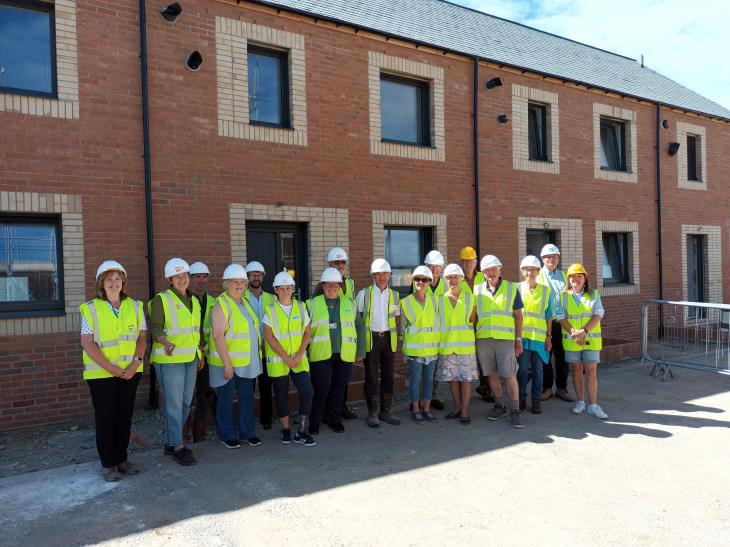 Seend villagers being shown around the new development at Hook Hollow.